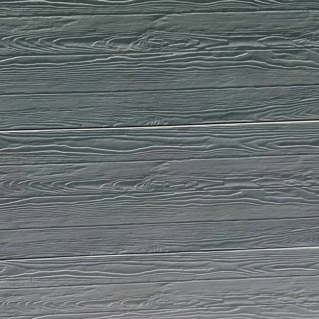 Fa deszka mintás, erezett betonpanel közelről